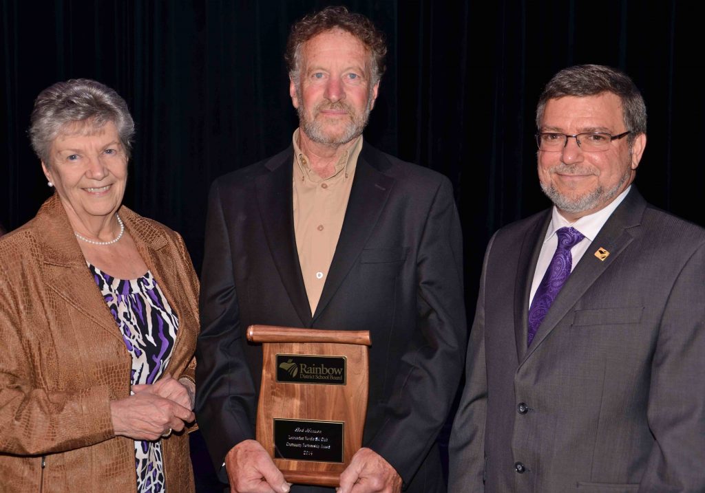 A staff member accepting an award