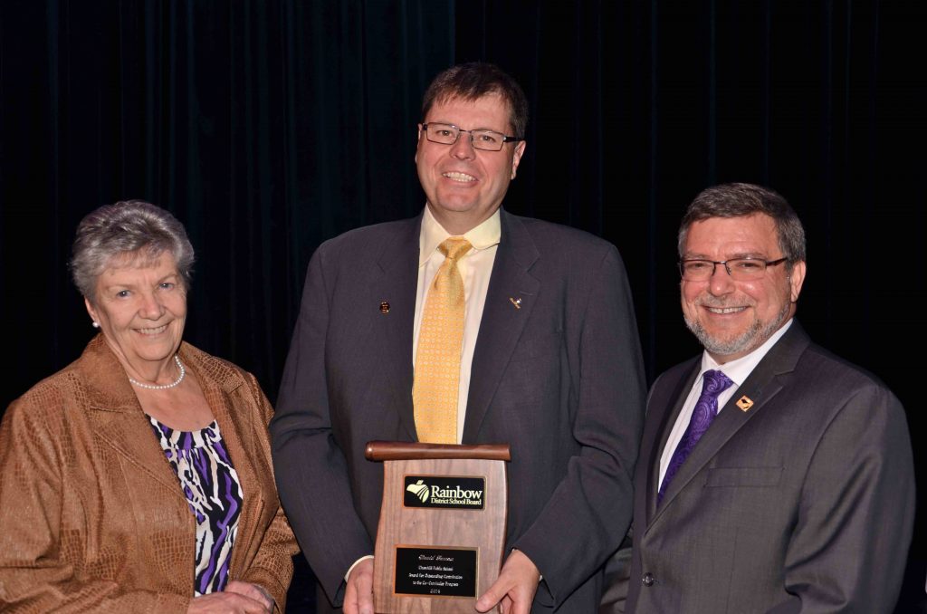 A staff member accepting an award