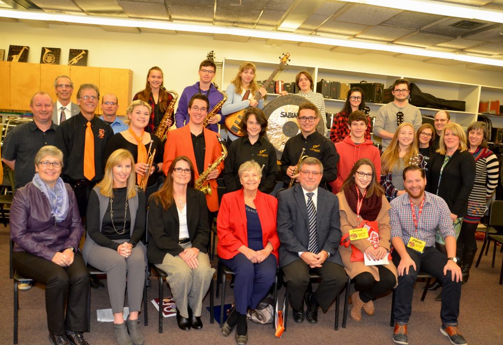 A group image of students, staff and members of the community.