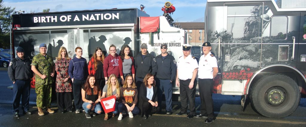 Images of students, fire fighters and canadian armed forces with the Vimy Commemorative Fire Truck