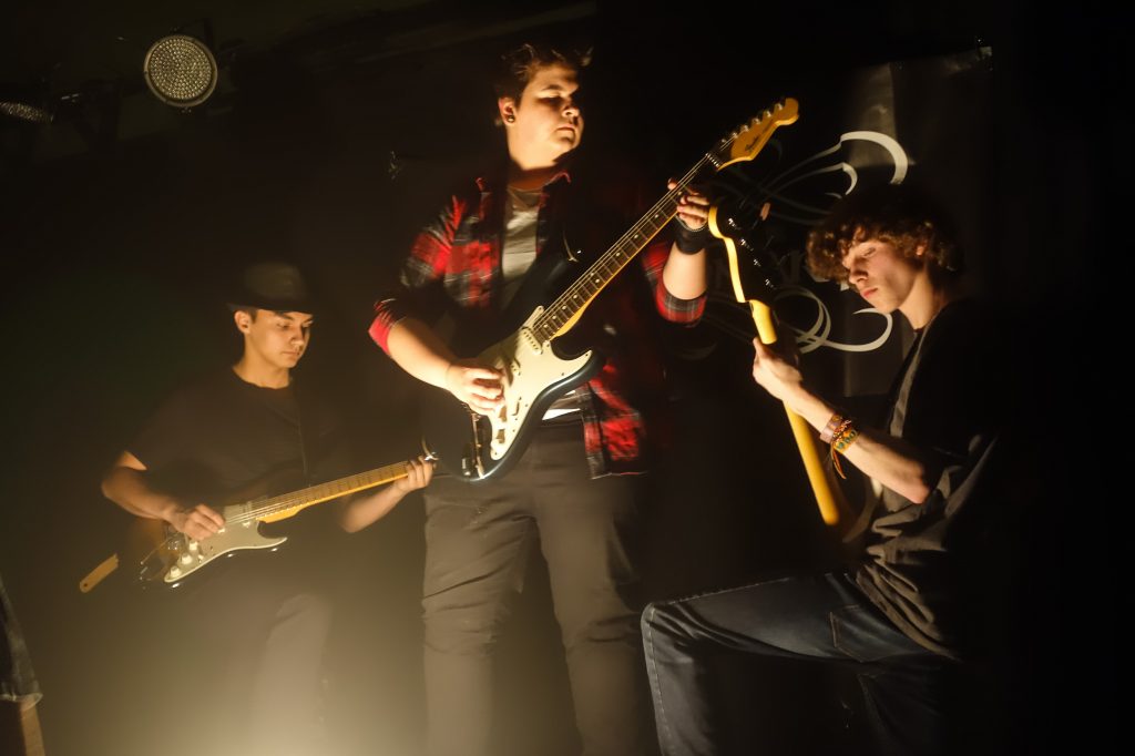 An image of students playing instruments