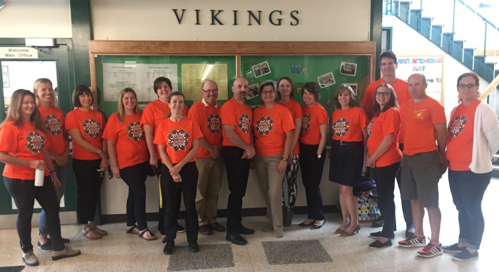 Lockerby staff wear orange