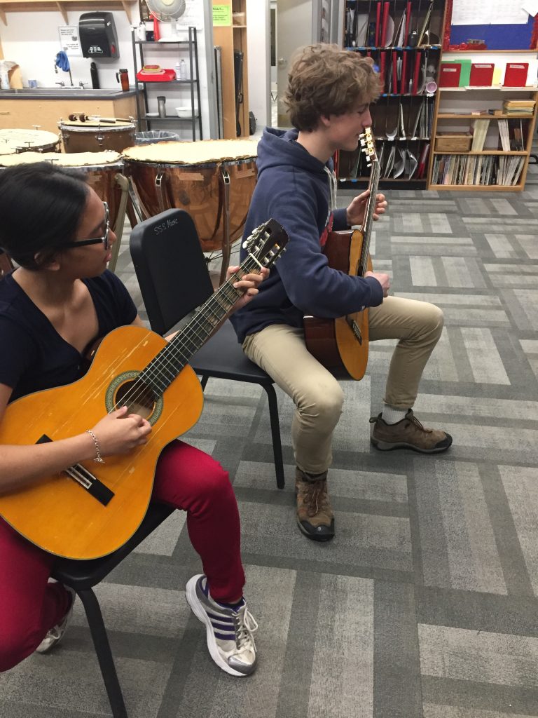 Students playing instruments