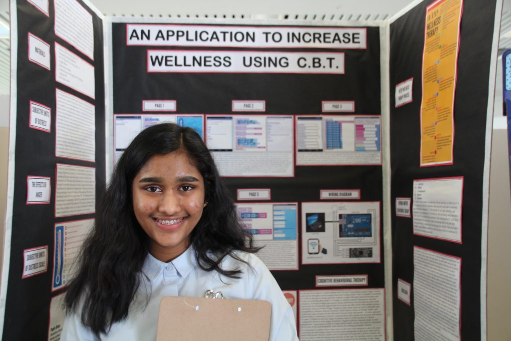 Student Nethra Wickramasinghe with her science fair project