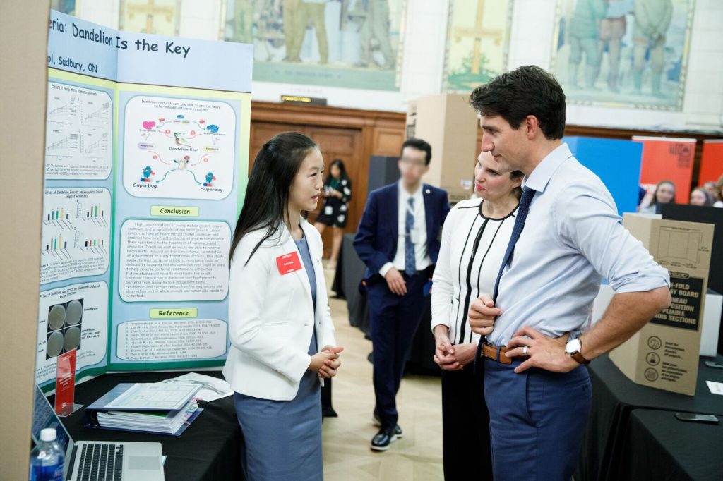 kerry yang speaking with Prime Minister Justin Trudeau