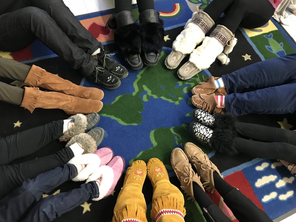 Students wearing moccasins