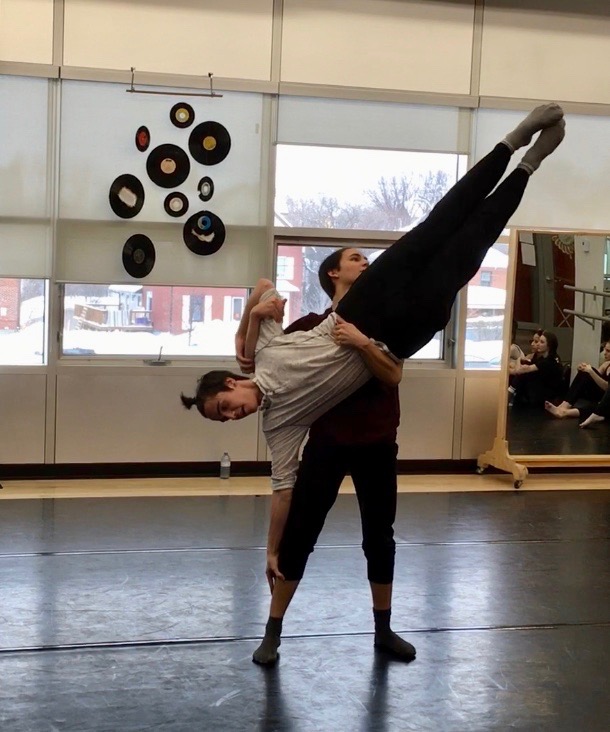 students practicing an elevated partner dance technique