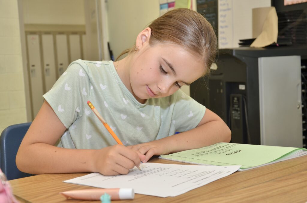 R.L. Beattie Public School student Zoey Cacciotti completes a math exercise in class.