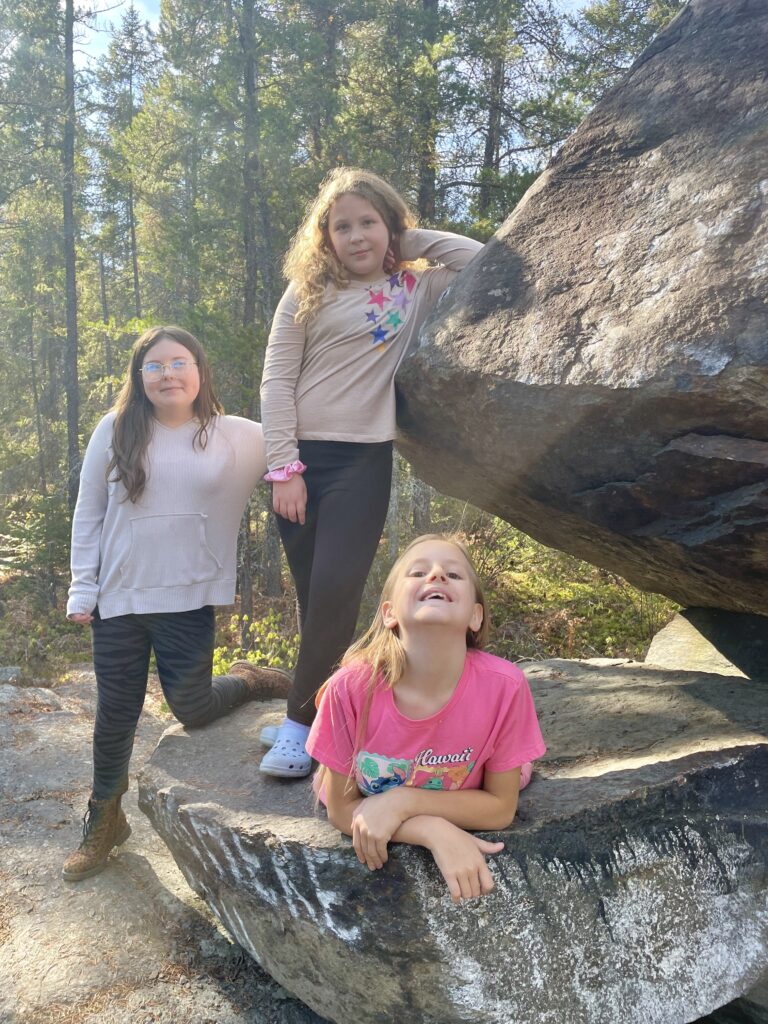 Grade 5 students Hazel Frey, left, Ella Sauvé and Marissa Desormeaux of C.R. Judd Public School enjoy some fresh air during Take Me Outside Day.